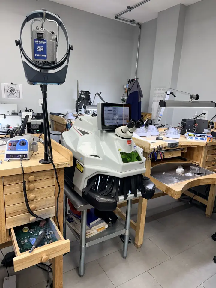 Laser welder and microscope